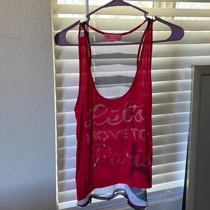 “Let’s move to Paris” red tank top.